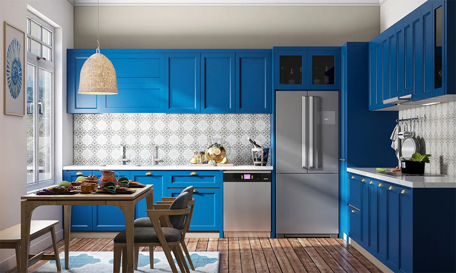 Bright blue kitchen base cabinet installation at the perfect height