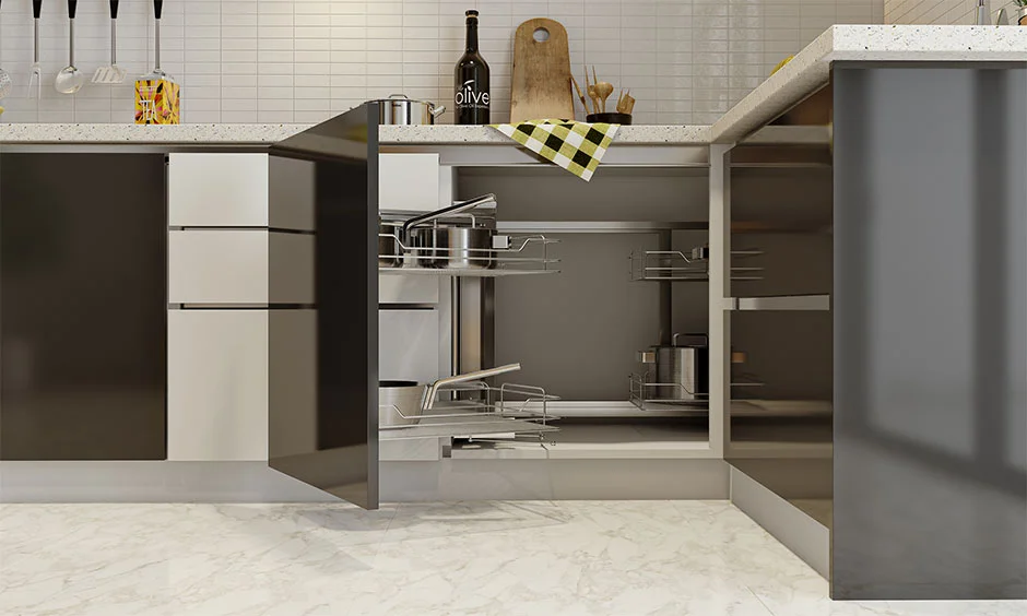 Carousel configuration kitchen base cabinet which converts dead corner into accessible storage
