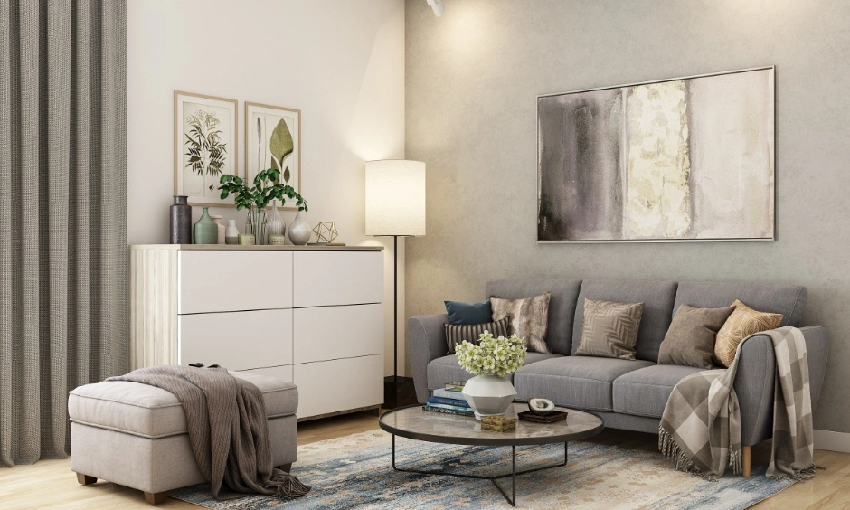 Wooden flooring and a soft rug create a warm, comfortable living room layout