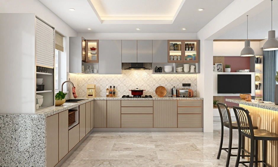 Spacious modular kitchen in Ahmedabad with concealed storage and a practical contemporary layout