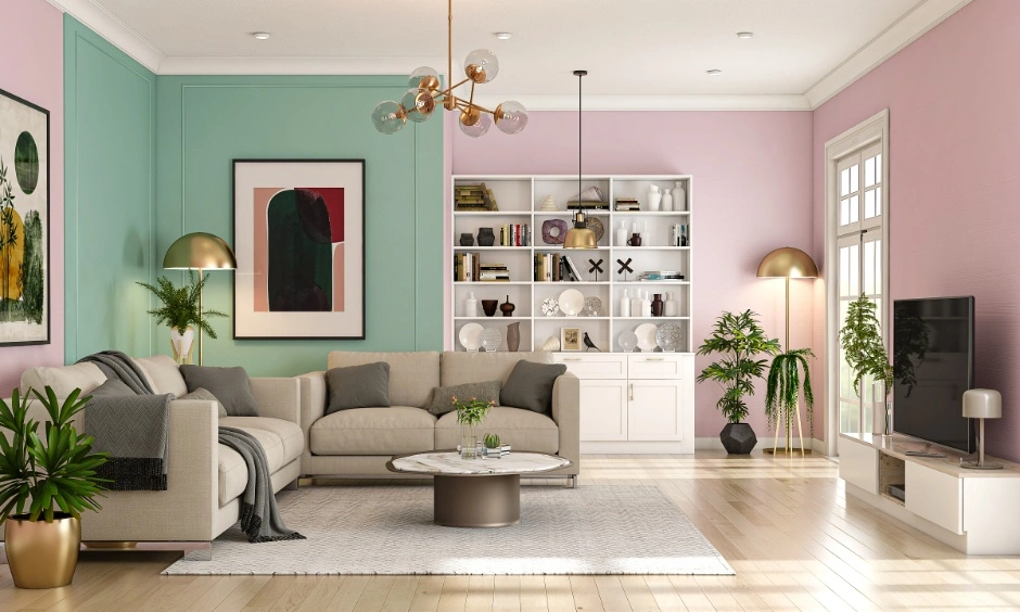 A pastel pink and pista living room features contemporary decor and warm wooden flooring