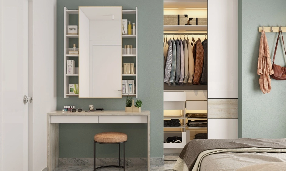 A customised wardrobe with integrated storage contributes to the overall 2BHK interior cost.
