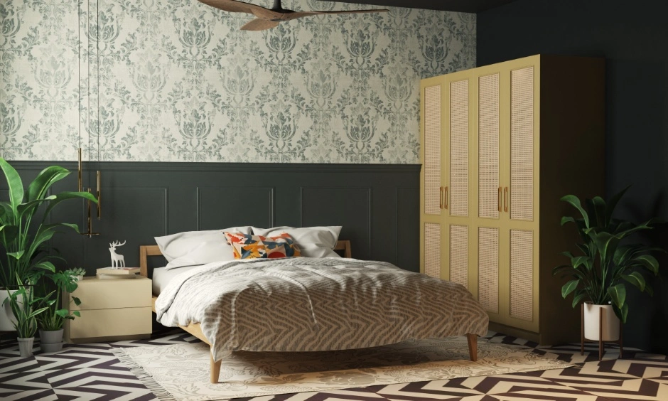 Nature-inspired bedroom with cane wardrobe shutters, deep green walls and earthy textures.
