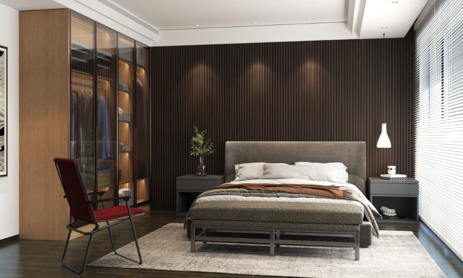 Premium bedroom with fluted wall panelling, glass wardrobe shutters and warm wood finishes.