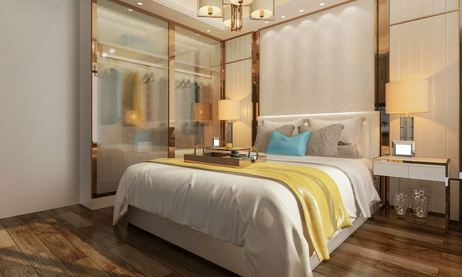 Sliding wardrobe doors soften the bedroom palette with a warm and elegant finish.