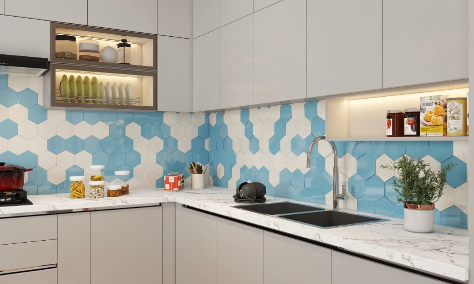 A modular kitchen features seamless storage and a blue patterned tiled backsplash.