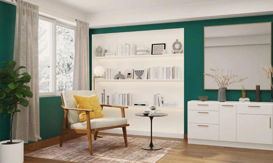 A reading corner features peacock green walls, built-in shelving and soft neutral furnishings.