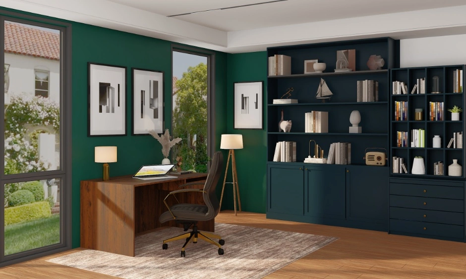 A home office features peacock green walls, built-in shelving and wooden furniture.