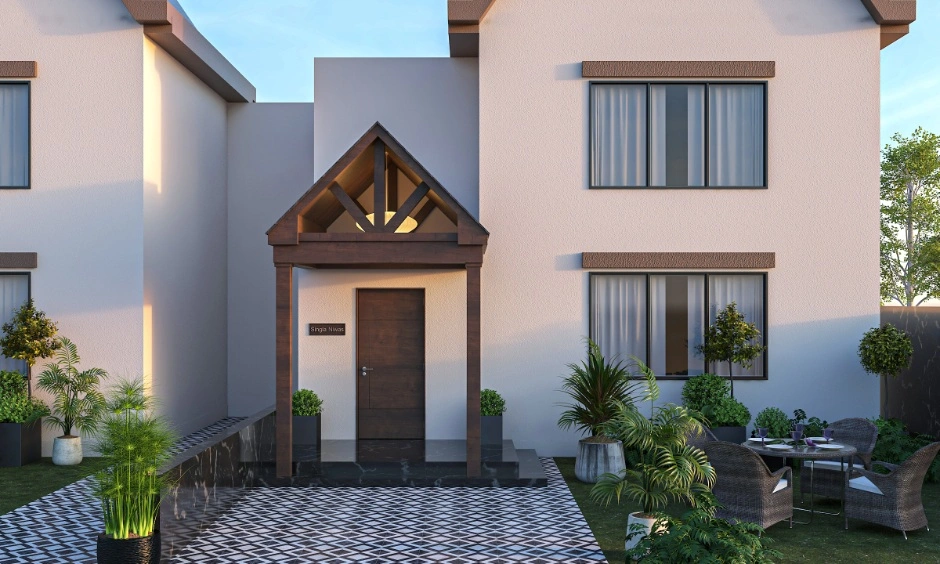 Modern bungalow exterior featuring beige walls, a black and white tiled verandah, and a small front garden.