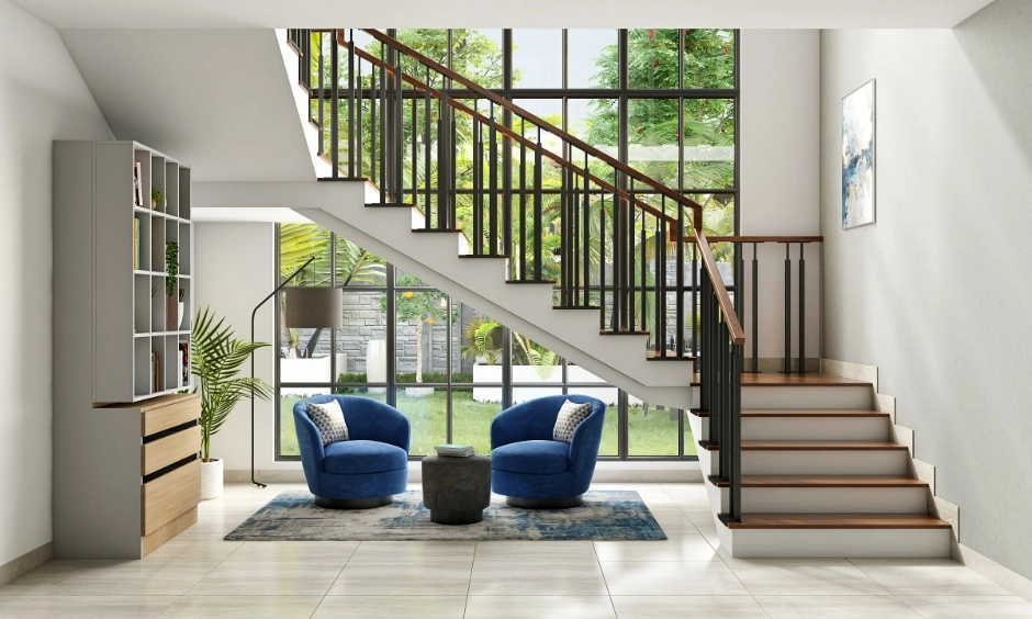 Luxury bungalow interior showcasing a double height living room with tall glass windows and staircase views.