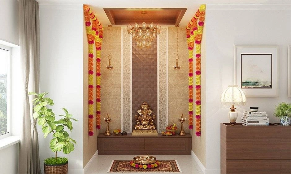 Pooja room ceiling design featuring a wooden false ceiling panel, warm ambient LED lighting, and a pendant lamp.