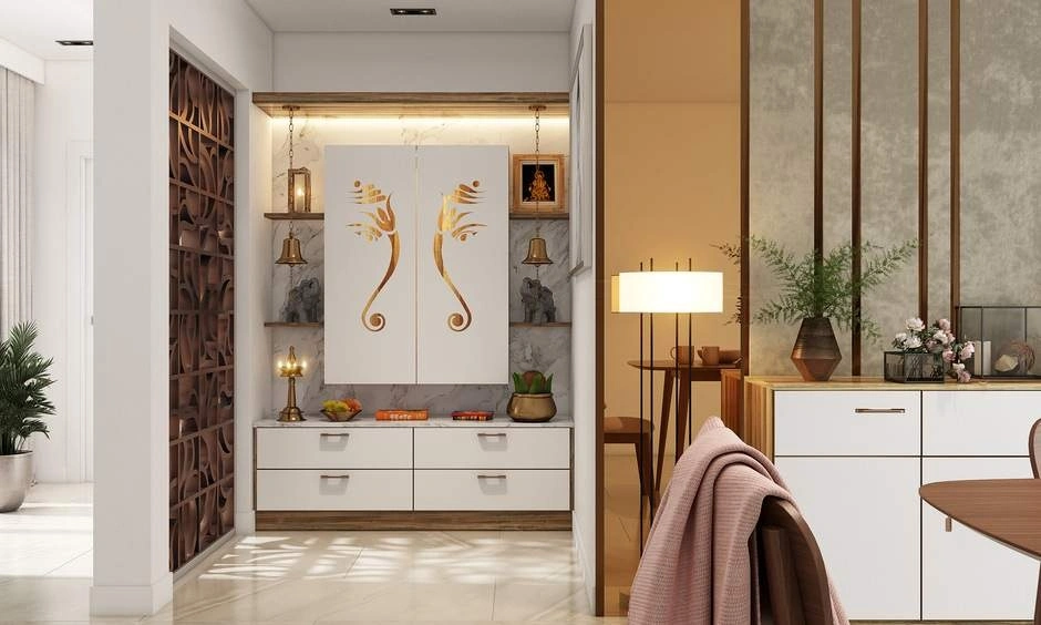 Detailed wooden mandir doors with Lord Ganesha cutwork design integrated into a pooja room layout as per Vastu.