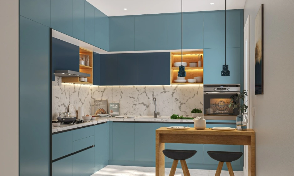 Sky blue cabinets and marble create a bright, modern kitchen with warmth.