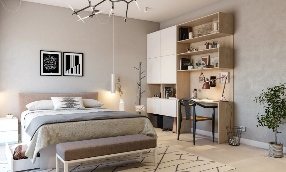 Soft neutral finishes and smart storage keep this Noida bedroom calm and practical.