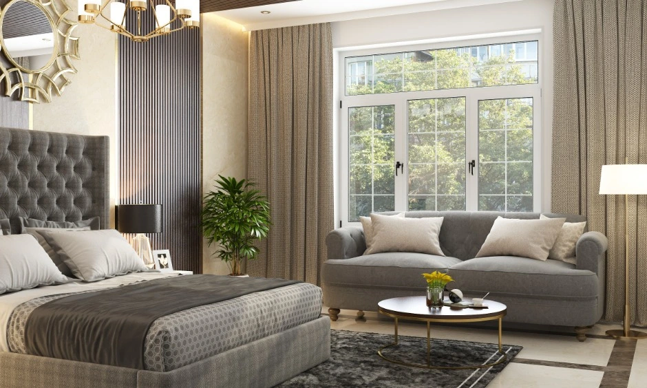 Earthy tones and warm lighting create a relaxed bedroom atmosphere in a Noida home