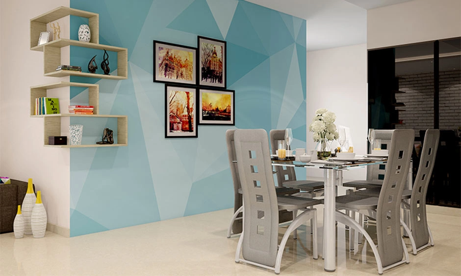 Light blue geometric triangle wall paint in a bright dining area.
