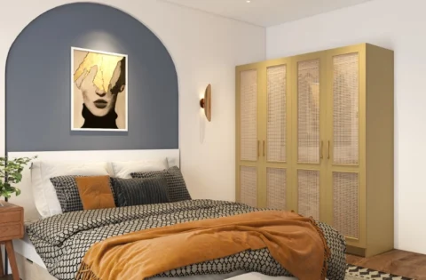 Delhi bedroom featuring cane wardrobe shutters, arched accent wall, and warm ambient lighting.