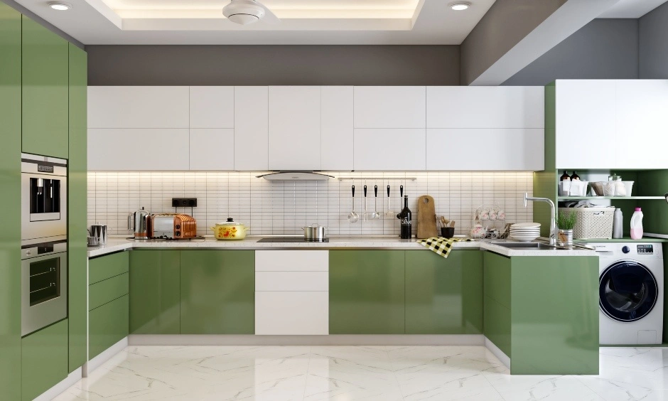 A green and white modular kitchen with sleek cabinets and integrated appliances.