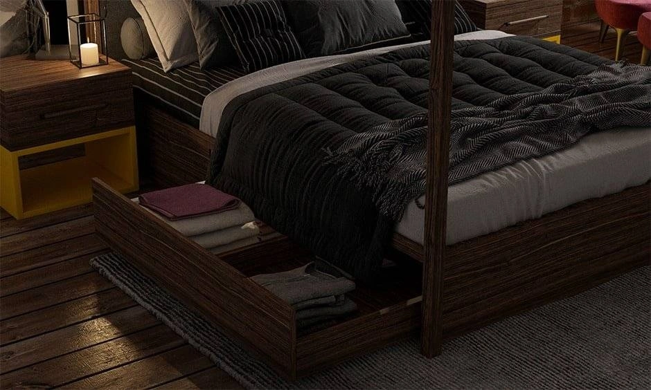 A modern bed is paired with bedside storage and built-in units for a compact bedroom.