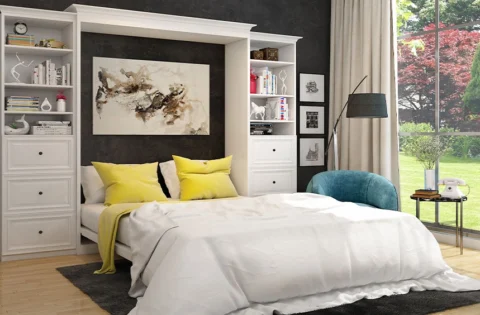 Modern bedroom with a Murphy bed, built-in shelving and warm ambient lighting.
