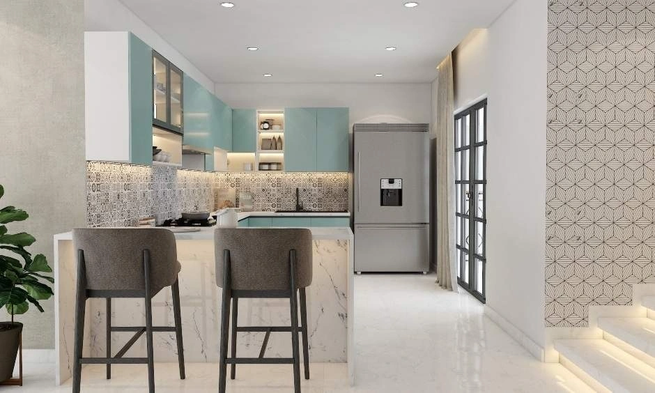 A compact modular kitchen combines a breakfast counter with streamlined cabinets and appliances.