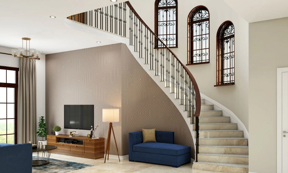 A modern living room with a striking staircase and elegant contemporary interiors.