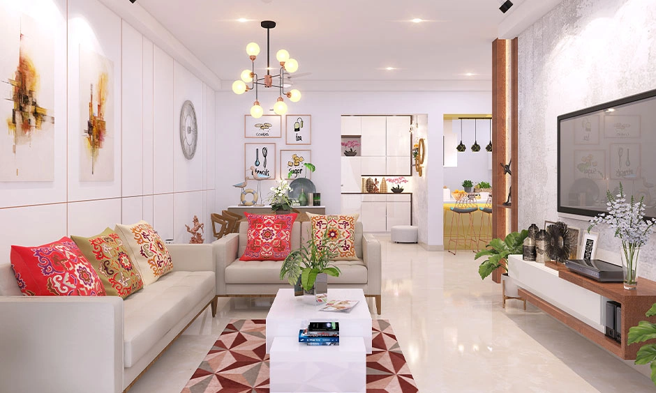 A bright living room features vibrant floral accents and minimalist decor.