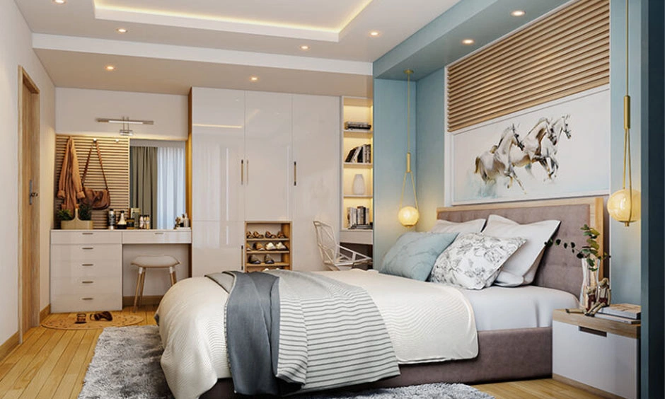Built-in wardrobes and cabinetry maximise storage while keeping the compact bedroom uncluttered.