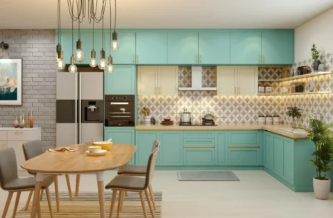Base, wall and tall kitchen cabinets form one continuous run in a matte laminate finish.
