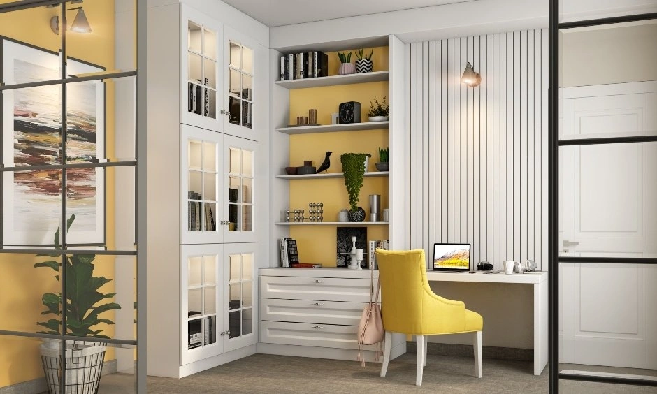 A yellow and white study area separates the work surface from integrated storage.
