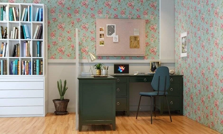 An L-shaped engineered wood study table provides extra counter space for home workspaces.