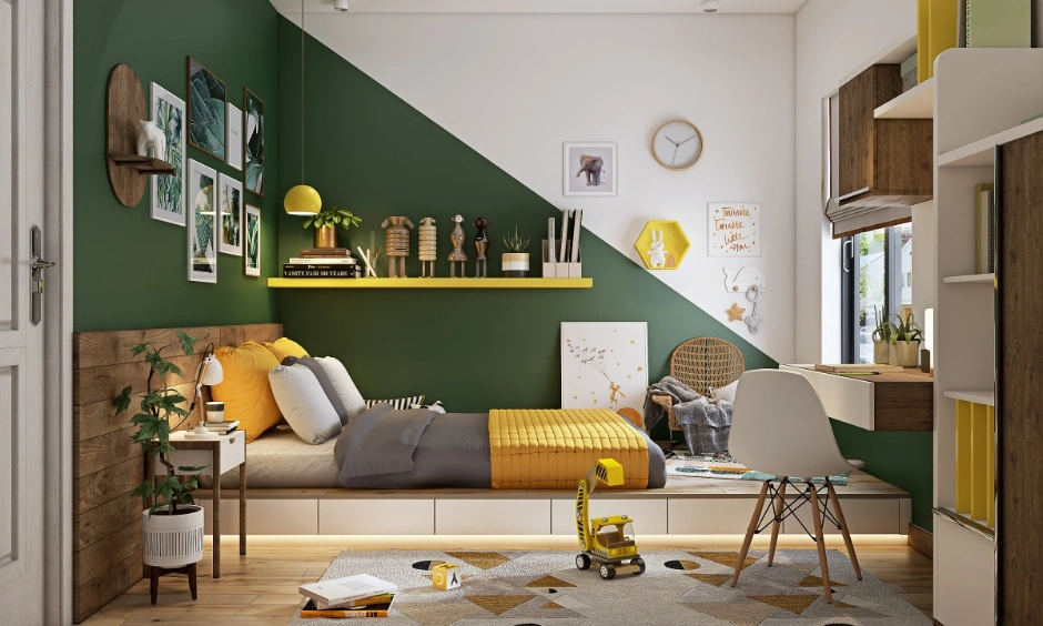 A kids' bedroom combines a green accent wall, bunk-style bed, study desk and overhead storage.