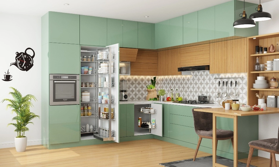 A modern kitchen combines green cabinetry, glass-finish shutters, open shelving and a light worktop