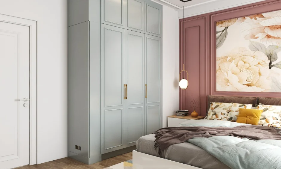 Matte wardrobe design ideas for interior styles include grey panelled shutters that balance a pink feature wall.